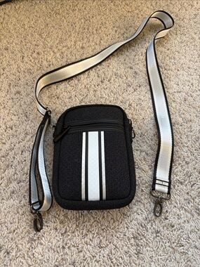 HAUTE SHORE Black Crossbody Bag with White Stripe
